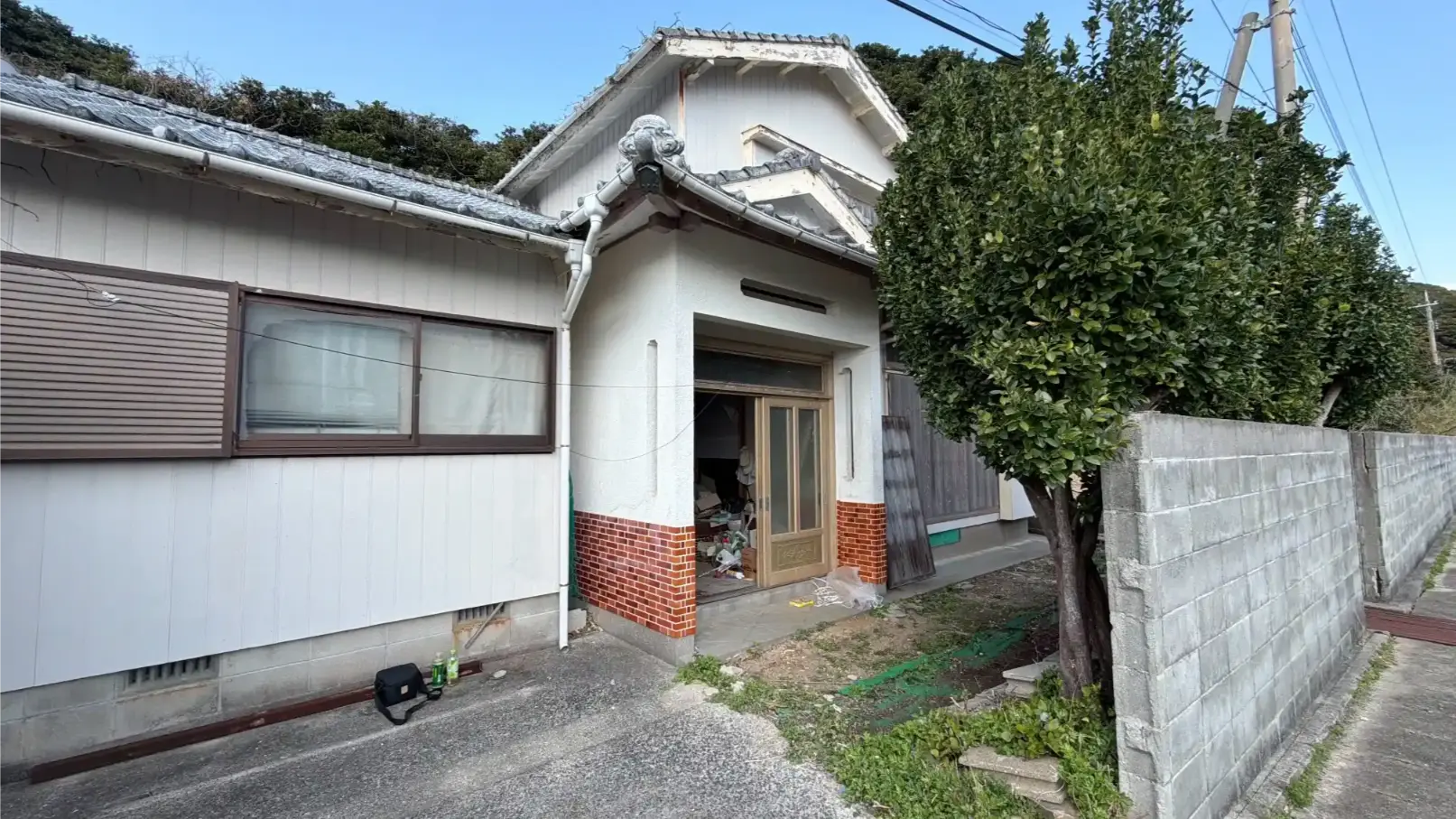 Traditional wooden house front facade on Naru Island, Goto